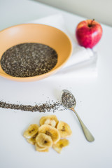 Healthy Chia seeds in bowl on the table close-up