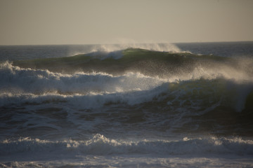 Closeup of Waves and Spray at sunset
