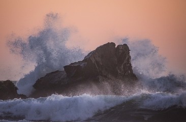 Wild Waves hitting a Rock in a beautiful sunset © Felix