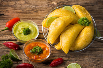 Empanadas with hot sauce, traditional Colombian food