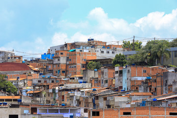 Fototapeta na wymiar Shacks in the favela on the hill