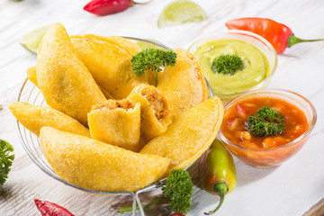 Empanadas with hot sauce, traditional Colombian food
