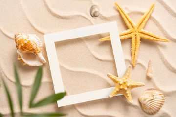 Fototapeta na wymiar Creative summer background, Sand, shells, Seastar with blurred Palm, vacation and travel concept, Flat lay top view copy space