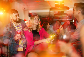 Obraz na płótnie Canvas Meeting man and woman in an entertaining night club