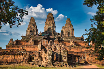 Fototapeta na wymiar Pre Rup Temple site among the ancient ruins of Angkor Wat Hindu temple complex in Cambodia