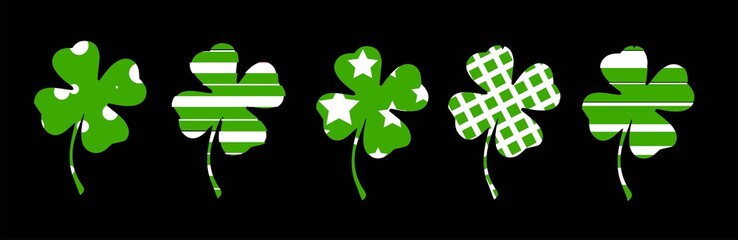 St.Patrick 's Day. Background, clover and shamrock. Elements for design isolated on black background..
