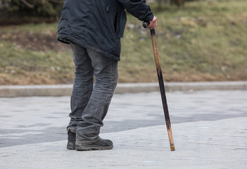 disabled person with cane on the street