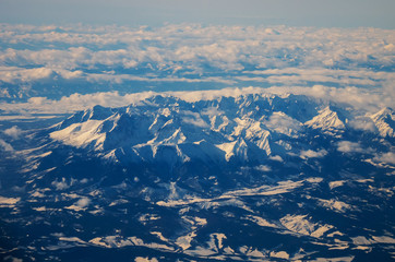 Fototapeta premium view of the Tatra mountains in winter from a height of ten thousand meters