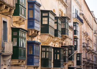 Famous colorful wooden balconies in narrow streets of Malta, Valleta. Architectural Maltese feature of of the island