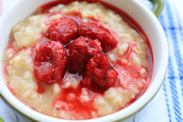 Tasty oatmeal porridge with raspberries