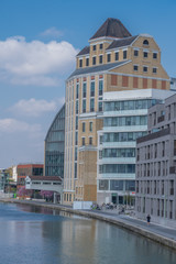 Paris, France - 04 14 2019: Canal Lourcq. Reflects of the great Pantin Mills