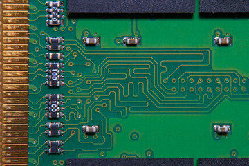 closeup of a green electronic circuit board