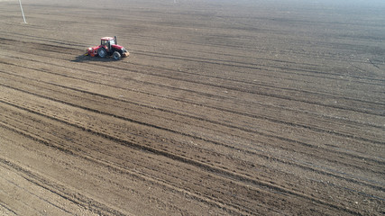 Rotary tiller planters grow peas on farms, Luannan County, Hebei Province, China
