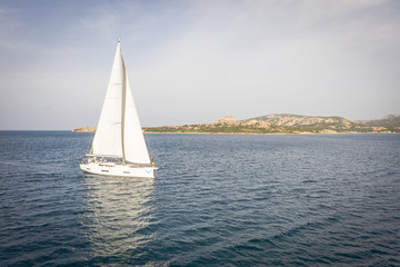 Fototapeta na wymiar Yacht Sailing Sardegna, Mediterranean Sea