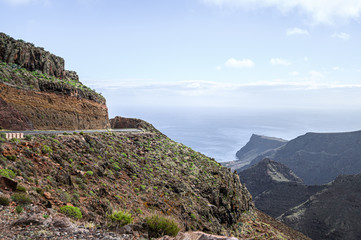 Fototapeta na wymiar Volcanic mountains on the island of La Gomera. Beautiful landscape background. Canary.