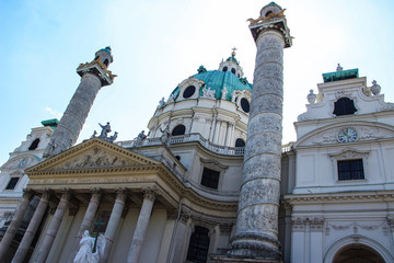 Close-up of the ancient St. Charles Church between the Trajan's columns. Vienna, Austria.