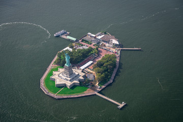 An isolated aerial photograph of the Statue of Liberty and Liberty park taken with the summer of...