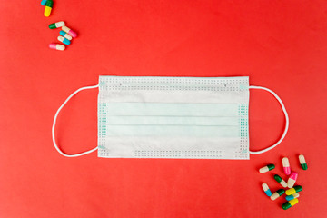 Top view of mask with scattered capsules around