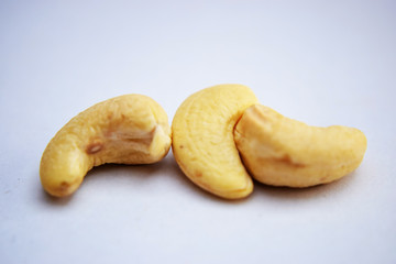 cashew nuts heap on white background Full depth of field Close-Up Stock Photography Image