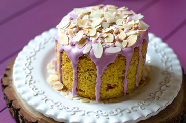 Easter cake with almond petals rabbits and tulips