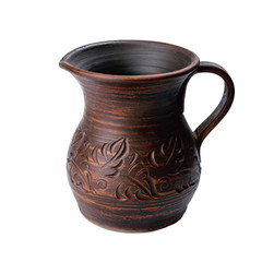 ceramic jug with handle isolated on white background. handicraft pattern on pot.