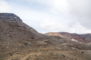 Gorely Volcano, Kamchatka Peninsula, Russia. An active volcano located in the south of Kamchatka. It consists of 11 cones and about 30 craters. Some craters are filled with acid or fresh water.