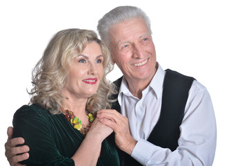 Close up portrait of happy senior couple hugging