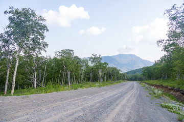 Fototapeta na wymiar Road among the hills, Kamchatka Peninsula, Russia.