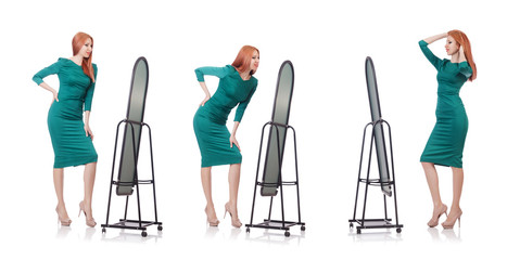 Woman trying new clothing on white