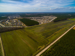 Sprawling Southern USA Suburb Built Alongside Rural Farmland