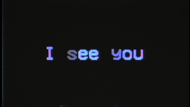 A scary VHS text, I see you, animated on black background, typical of a horror flick. Glitch effect.