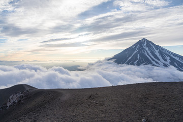 Fototapeta premium Koryaksky volcano, Kamchatka peninsula, Russia. An active volcano 35 km north of the city of Petropavlovsk-Kamchatsky. The absolute height is 3430 meters above sea level.