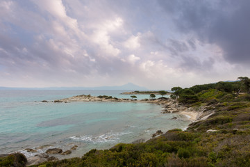 Fototapeta na wymiar Beautiful scenery by the sea in Vourvourou, Sithonia, Chalkidiki, Greece