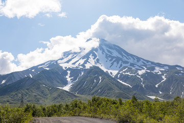 Fototapeta premium Vilyuchinsky volcano, Kamchatka peninsula, Russia. It is located southwest of the city of Petropavlovsk-Kamchatsky behind Avacha Bay.