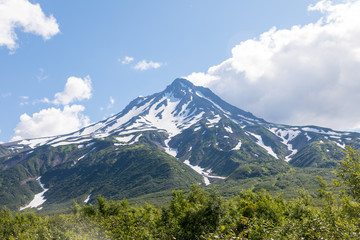 Fototapeta premium Vilyuchinsky volcano, Kamchatka peninsula, Russia. It is located southwest of the city of Petropavlovsk-Kamchatsky behind Avacha Bay.