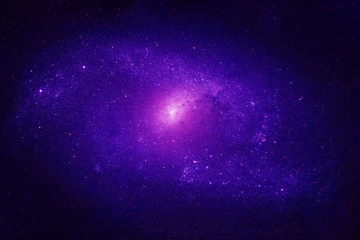 Obraz na płótnie Canvas A blue galaxy in deep space. Elements of this image were furnished by NASA.
