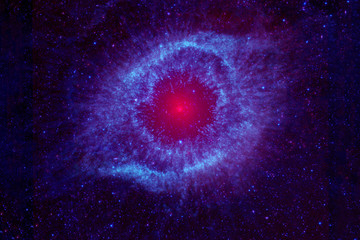 The space nebula is round shaped with a core. Elements of this image were furnished by NASA. © Artsiom P
