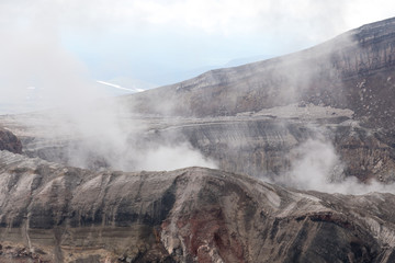 Gorely Volcano, Kamchatka Peninsula, Russia. An active volcano located in the south of Kamchatka. It consists of 11 cones and about 30 craters. Some craters are filled with acid or fresh water.