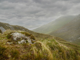 High land in Connemara, county Galway, Nobody, Cloudy sky, green wild grass. Ireland.