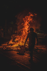  barricade in fire in the city at night