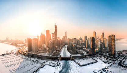 Chicago aerial view of frozen river and lake shore drive during the polar vortex