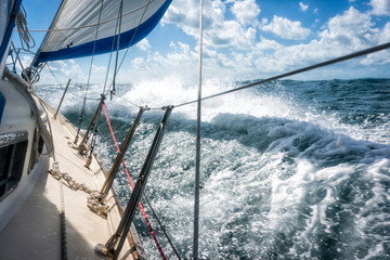 Rough seas during sailing crossing large crashing waves seasick passengers test of strength trial of character