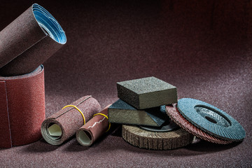 abrasive tools rolls of sandpaper with pads and flap wheels