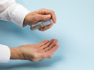 washing hands with hand sanitizer sometimes used for protection from viruses such as Novel...