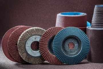 abrasive tools set of flap wheels and rolled sandpaper - obrazy, fototapety, plakaty