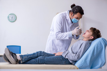 Young boy visiting doctor in hospital