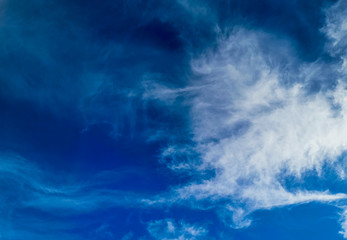 Fototapeta na wymiar Bright blue sky with clouds, background for design, decoration or wallpaper