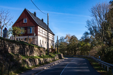 farmhouse  above the country road