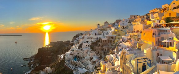 Oia, Santorini, Greece in the glow of a shimmery sunset