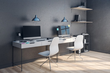 Minimalistic designer computer with sticker on screen